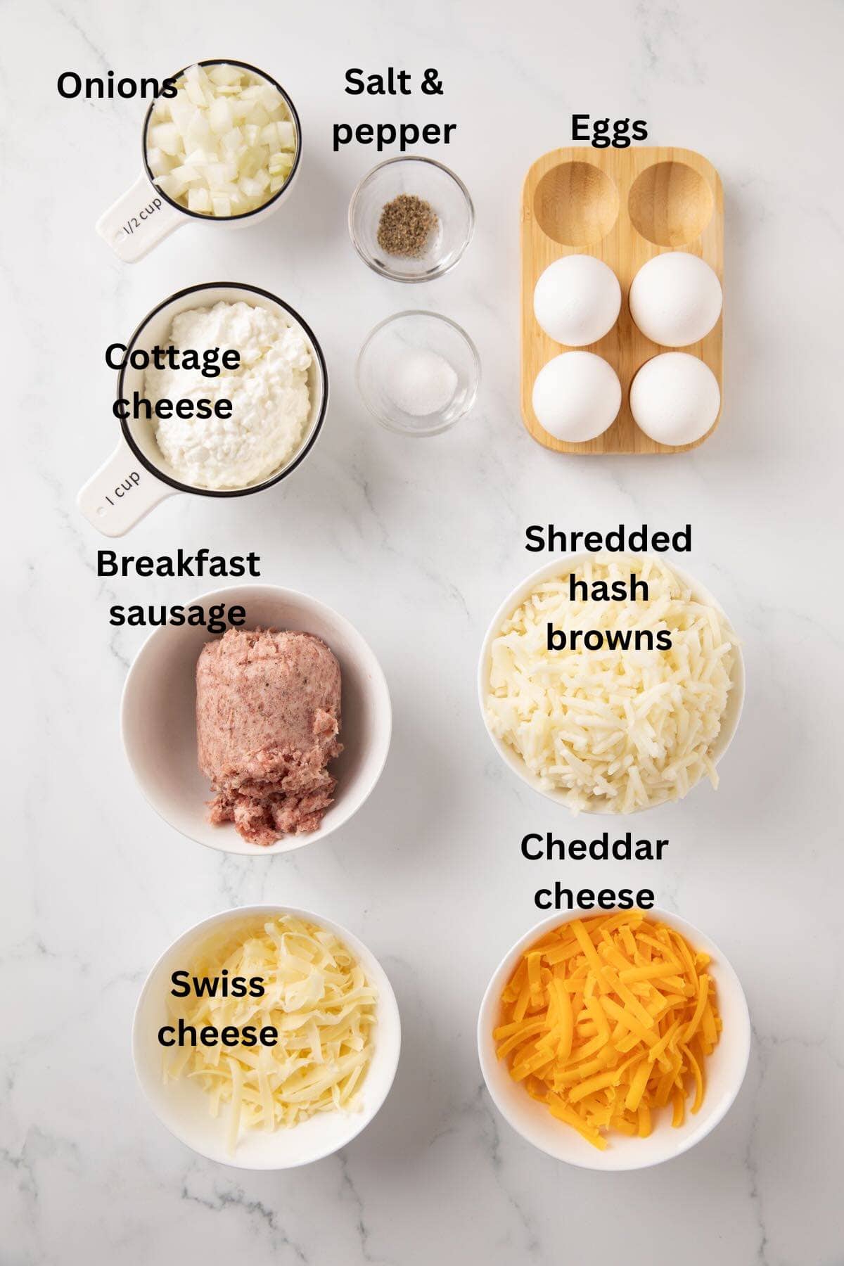 Breakfast muffin ingredients include eggs, cheese, sausage, cottage cheese, and onions. 