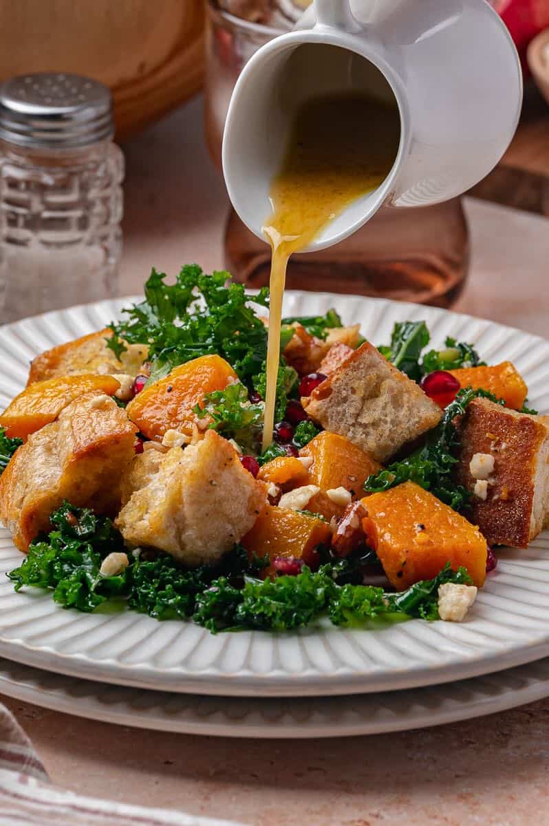 Fall Panzanella with Maple Vinaigrette with kale, sourdough croutons, feta cheese, and butternut squash.