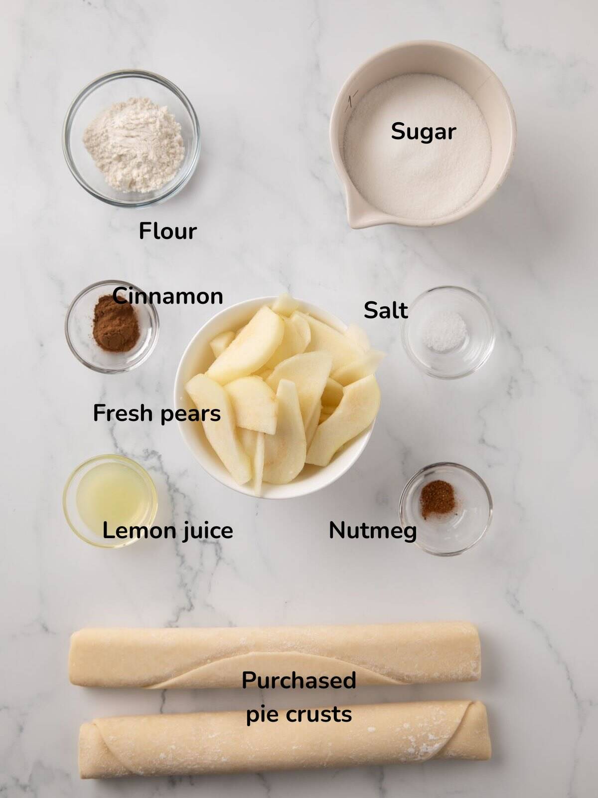 Ingredients for pear pie include: fresh pears, flour, pie crusts, sugar, lemon juice and cinnamon. 